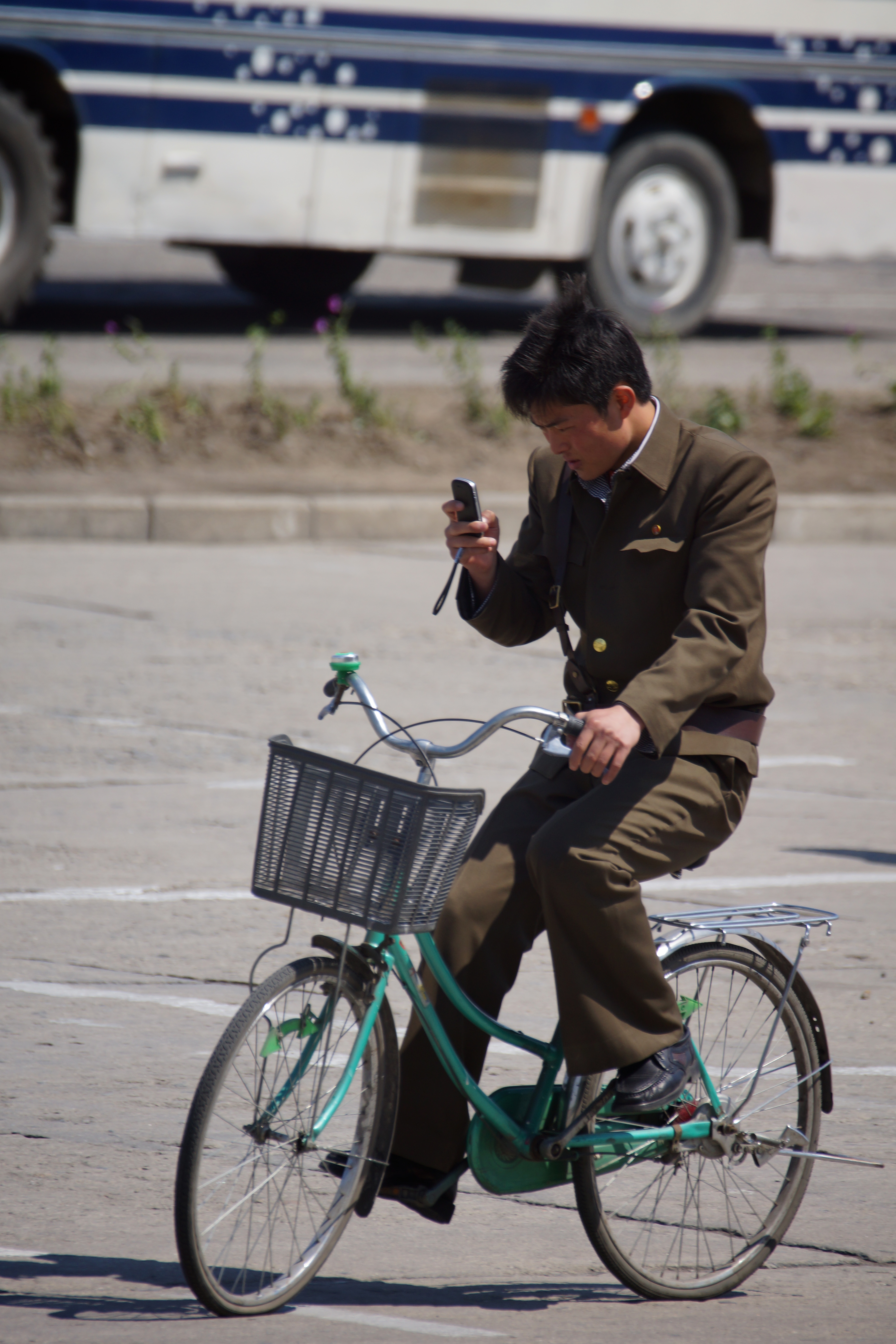 Cyclist on mobile phone